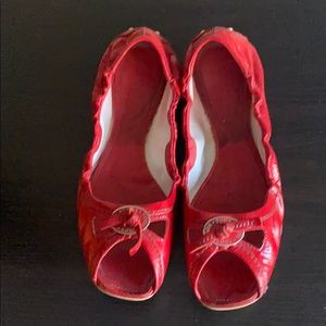 Tods whiskey cutout flats in red